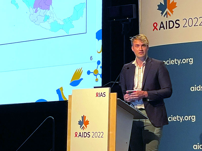 Angel Algarin presenting at AIDS 2022