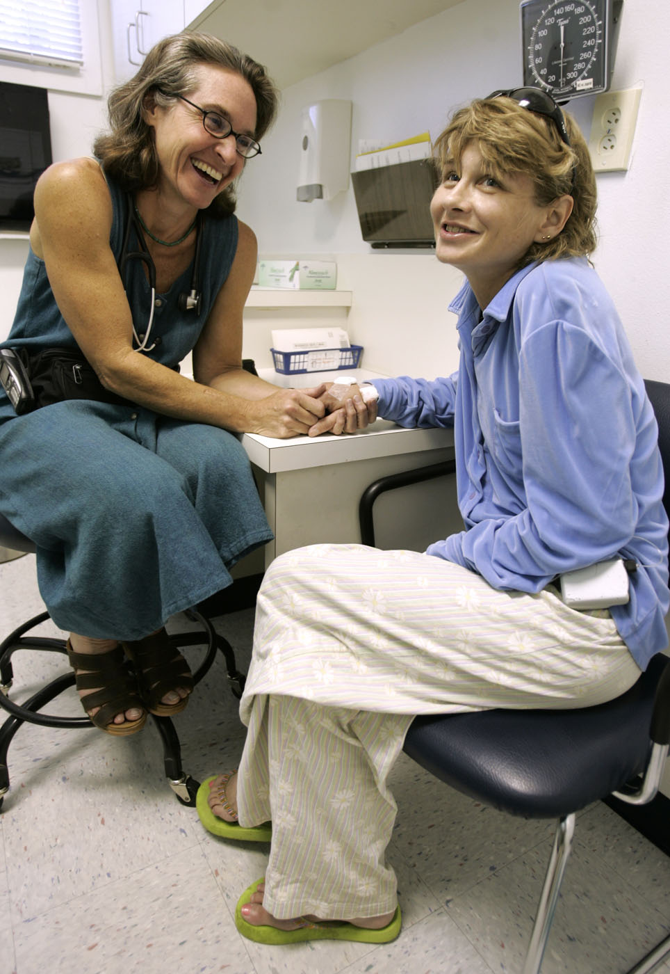 Providing care to patient in clinic for uninsured, Austin, Texas, 2006.