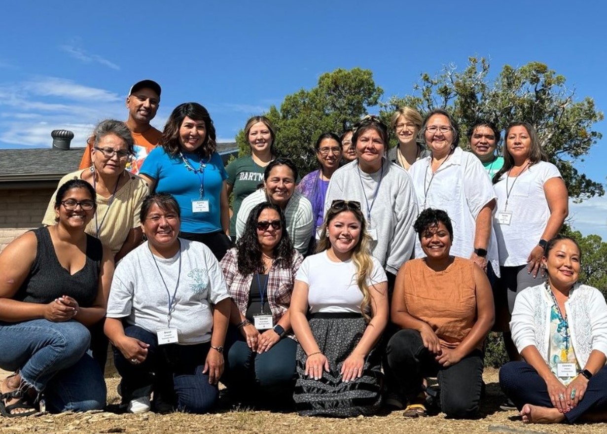 Group photo of the HEAL Southwest Leadership Cohort sitting outside